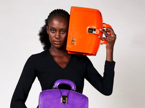 Luxury fashion British brand DIDI Creations handmade leather briefcase bag orange briefcase purple briefcase orange bag orangeleatherbag bosslady executive luxury bag madeinitaly with ethically sourced genuine leather by didicreations women fashion.     